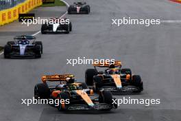 Lando Norris (GBR) McLaren MCL60 and Oscar Piastri (AUS) McLaren MCL60 battle for position. 18.06.2023. Formula 1 World Championship, Rd 9, Canadian Grand Prix, Montreal, Canada, Race Day.