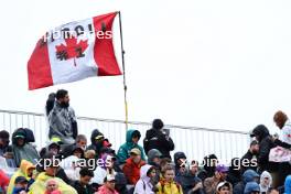 Circuit atmosphere - fans in the grandstand and a banner for Zhou Guanyu (CHN) Alfa Romeo F1 Team. 17.06.2023. Formula 1 World Championship, Rd 9, Canadian Grand Prix, Montreal, Canada, Qualifying Day.