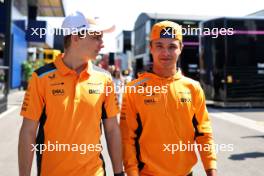 (L to R): Oscar Piastri (AUS) McLaren with team mate Lando Norris (GBR) McLaren. 02.06.2023 Formula 1 World Championship, Rd 8, Spanish Grand Prix, Barcelona, Spain, Practice Day.