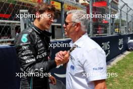 (L to R): George Russell (GBR) Mercedes AMG F1 with Derek Warwick (GBR) FIA Steward on the grid. 04.06.2023. Formula 1 World Championship, Rd 8, Spanish Grand Prix, Barcelona, Spain, Race Day.