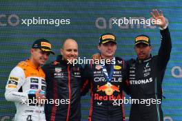 1st place Max Verstappen (NLD) Red Bull Racing RB19 with Gianpiero Lambiase (ITA) Red Bull Racing Engineer , 2nd place Lando Norris (GBR) McLaren MCL60 and 3rd place Lewis Hamilton (GBR) Mercedes AMG F1 W14. 09.07.2023. Formula 1 World Championship, Rd 11, British Grand Prix, Silverstone, England, Race Day.