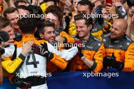Lando Norris (GBR) McLaren celebrates his second position in parc ferme with the team. 09.07.2023. Formula 1 World Championship, Rd 11, British Grand Prix, Silverstone, England, Race Day.