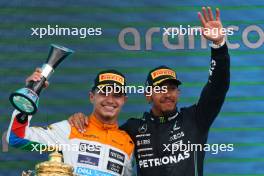 Lando Norris (GBR) McLaren and Lewis Hamilton (GBR) Mercedes AMG F1. 09.07.2023. Formula 1 World Championship, Rd 11, British Grand Prix, Silverstone, England, Race Day.
