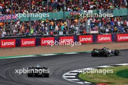 Lewis Hamilton (GBR) Mercedes AMG F1 W14 leads Pierre Gasly (FRA) Alpine F1 Team A523. 09.07.2023. Formula 1 World Championship, Rd 11, British Grand Prix, Silverstone, England, Race Day.