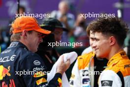 (L to R): Pole sitter Max Verstappen (NLD) Red Bull Racing in qualifying parc ferme with second placed Lando Norris (GBR) McLaren. 08.07.2023. Formula 1 World Championship, Rd 11, British Grand Prix, Silverstone, England, Qualifying Day.