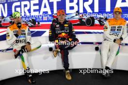 (L to R): Lando Norris (GBR) McLaren with Max Verstappen (NLD) Red Bull Racing and Oscar Piastri (AUS) McLaren in the post qualifying FIA Press Conference. 08.07.2023. Formula 1 World Championship, Rd 11, British Grand Prix, Silverstone, England, Qualifying Day.