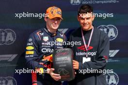 (L to R): Max Verstappen (NLD) Red Bull Racing receives the Pirelli Pole Position Award from Paulo Dybala (ARG) Football Player. 08.07.2023. Formula 1 World Championship, Rd 11, British Grand Prix, Silverstone, England, Qualifying Day.