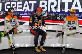 (L to R): Lando Norris (GBR) McLaren with Max Verstappen (NLD) Red Bull Racing and Oscar Piastri (AUS) McLaren in the post qualifying FIA Press Conference. 08.07.2023. Formula 1 World Championship, Rd 11, British Grand Prix, Silverstone, England, Qualifying Day.