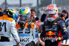 (L to R): Oscar Piastri (AUS) McLaren; Lando Norris (GBR) McLaren; and Max Verstappen (NLD) Red Bull Racing in qualifying parc ferme. 08.07.2023. Formula 1 World Championship, Rd 11, British Grand Prix, Silverstone, England, Qualifying Day.
