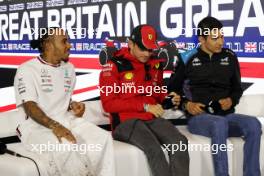 (L to R): Lewis Hamilton (GBR) Mercedes AMG F1 with Charles Leclerc (MON) Ferrari and Esteban Ocon (FRA) Alpine F1 Team in the FIA Press Conference. 06.07.2023. Formula 1 World Championship, Rd 11, British Grand Prix, Silverstone, England, Preparation Day.