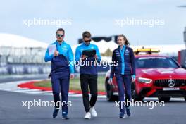 Logan Sargeant (USA) Williams Racing (Centre) walks the circuit with Gaetan Jego, Williams Racing Race Engineer (Left) and Elizabeth Wood Boyer (GBR) Williams Racing Performance Engineer (Right). 06.07.2023. Formula 1 World Championship, Rd 11, British Grand Prix, Silverstone, England, Preparation Day.