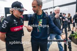 (L to R): Valtteri Bottas (FIN) Alfa Romeo F1 Team with Adam Norris (GBR). 06.07.2023. Formula 1 World Championship, Rd 11, British Grand Prix, Silverstone, England, Preparation Day.