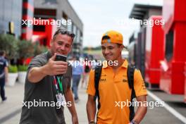 Lando Norris (GBR) McLaren with fan. 21.07.2023. Formula 1 World Championship, Rd 12, Hungarian Grand Prix, Budapest, Hungary, Practice Day.