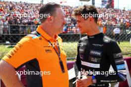(L to R): Zak Brown (USA) McLaren Executive Director with Lando Norris (GBR) McLaren on the grid. 23.07.2023. Formula 1 World Championship, Rd 12, Hungarian Grand Prix, Budapest, Hungary, Race Day.