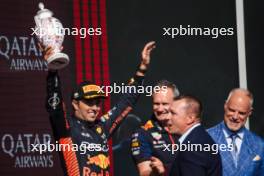 Sergio Perez (MEX) Red Bull Racing celebrates his third position on the podium. 23.07.2023. Formula 1 World Championship, Rd 12, Hungarian Grand Prix, Budapest, Hungary, Race Day.
