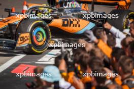 Lando Norris (GBR) McLaren MCL60, second position, in parc ferme with the team. 23.07.2023. Formula 1 World Championship, Rd 12, Hungarian Grand Prix, Budapest, Hungary, Race Day.