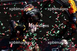 Max Verstappen (NLD) Red Bull Racing retrieves his broken trophy on the podium with Sergio Perez (MEX) Red Bull Racing and Lando Norris (GBR) McLaren. 23.07.2023. Formula 1 World Championship, Rd 12, Hungarian Grand Prix, Budapest, Hungary, Race Day.