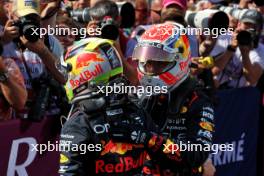 Race winner Max Verstappen (NLD) Red Bull Racing celebrates in parc ferme (Right) with third placed team mate Sergio Perez (MEX) Red Bull Racing. 23.07.2023. Formula 1 World Championship, Rd 12, Hungarian Grand Prix, Budapest, Hungary, Race Day.