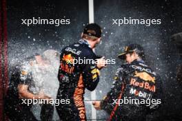 Race winner Max Verstappen (NLD) Red Bull Racing celebrates on the podium with Paul Monaghan (GBR) Red Bull Racing Chief Engineer and team mate Sergio Perez (MEX) Red Bull Racing. 23.07.2023. Formula 1 World Championship, Rd 12, Hungarian Grand Prix, Budapest, Hungary, Race Day.