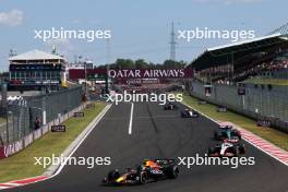 Sergio Perez (MEX) Red Bull Racing RB19. 23.07.2023. Formula 1 World Championship, Rd 12, Hungarian Grand Prix, Budapest, Hungary, Race Day.