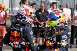 (L to R): Race winner Max Verstappen (NLD) Red Bull Racing celebrates in parc ferme with team mate Sergio Perez (MEX) Red Bull Racing. 03.09.2023. Formula 1 World Championship, Rd 15, Italian Grand Prix, Monza, Italy, Race Day.