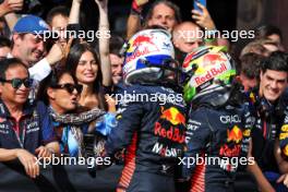 Race winner Max Verstappen (NLD) Red Bull Racing celebrates with the team with second placed Sergio Perez (MEX) Red Bull Racing. 03.09.2023. Formula 1 World Championship, Rd 15, Italian Grand Prix, Monza, Italy, Race Day.