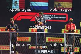 The podium (L to R): Sergio Perez (MEX) Red Bull Racing, second; Max Verstappen (NLD) Red Bull Racing, race winner; Carlos Sainz Jr (ESP) Ferrari, third. 03.09.2023. Formula 1 World Championship, Rd 15, Italian Grand Prix, Monza, Italy, Race Day.