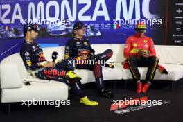 (L to R): Sergio Perez (MEX) Red Bull Racing; Max Verstappen (NLD) Red Bull Racing; and Carlos Sainz Jr (ESP) Ferrari, in the post race FIA Press Conference. 03.09.2023. Formula 1 World Championship, Rd 15, Italian Grand Prix, Monza, Italy, Race Day.