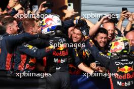 Race winner Max Verstappen (NLD) Red Bull Racing celebrates with the team with second placed Sergio Perez (MEX) Red Bull Racing. 03.09.2023. Formula 1 World Championship, Rd 15, Italian Grand Prix, Monza, Italy, Race Day.