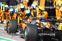 Oscar Piastri (AUS) McLaren MCL60 makes a pit stop. 03.09.2023. Formula 1 World Championship, Rd 15, Italian Grand Prix, Monza, Italy, Race Day.