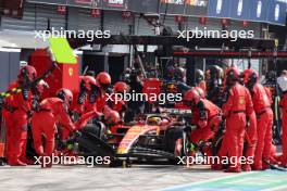 Charles Leclerc (MON) Ferrari SF-23 makes a pit stop. 03.09.2023. Formula 1 World Championship, Rd 15, Italian Grand Prix, Monza, Italy, Race Day.