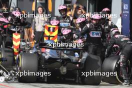 Esteban Ocon (FRA) Alpine F1 Team A523 makes a pit stop. 03.09.2023. Formula 1 World Championship, Rd 15, Italian Grand Prix, Monza, Italy, Race Day.