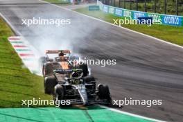 Lewis Hamilton (GBR) Mercedes AMG F1 W14 and Oscar Piastri (AUS) McLaren MCL60 battle for position. 03.09.2023. Formula 1 World Championship, Rd 15, Italian Grand Prix, Monza, Italy, Race Day.