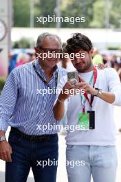 Stefano Domenicali (ITA) Formula One President and CEO with a fan. 31.08.2023. Formula 1 World Championship, Rd 15, Italian Grand Prix, Monza, Italy, Preparation Day.