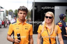 (L to R): Lando Norris (GBR) McLaren with Sophie Ogg (GBR) McLaren Communications Director. 31.08.2023. Formula 1 World Championship, Rd 15, Italian Grand Prix, Monza, Italy, Preparation Day.