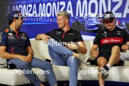 (L to R): Sergio Perez (MEX) Red Bull Racing; Nico Hulkenberg (GER) Haas F1 Team; and Valtteri Bottas (FIN) Alfa Romeo F1 Team, in the FIA Press Conference. 31.08.2023. Formula 1 World Championship, Rd 15, Italian Grand Prix, Monza, Italy, Preparation Day.