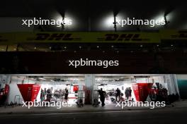 Alfa Romeo F1 Team pit garages at night. 22.09.2023. Formula 1 World Championship, Rd 17, Japanese Grand Prix, Suzuka, Japan, Practice Day.