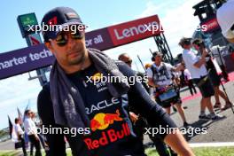 Sergio Perez (MEX) Red Bull Racing on the grid. 24.09.2023. Formula 1 World Championship, Rd 17, Japanese Grand Prix, Suzuka, Japan, Race Day.