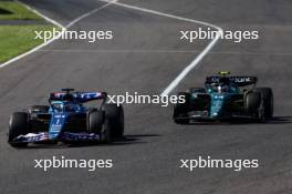 Esteban Ocon (FRA), Alpine F1 Team Fernando Alonso (ESP), Aston Martin Racing  24.09.2023. Formula 1 World Championship, Rd 17, Japanese Grand Prix, Suzuka, Japan, Race Day.
