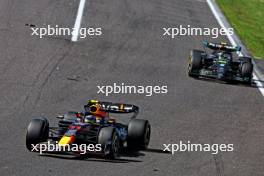 Sergio Perez (MEX) Red Bull Racing RB19. 24.09.2023. Formula 1 World Championship, Rd 17, Japanese Grand Prix, Suzuka, Japan, Race Day.