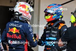 (L to R): Pole sitter Max Verstappen (NLD) Red Bull Racing in qualifying parc ferme with second placed Lando Norris (GBR) McLaren. 23.09.2023. Formula 1 World Championship, Rd 17, Japanese Grand Prix, Suzuka, Japan, Qualifying Day.