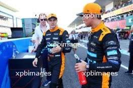 Lando Norris (GBR) McLaren (Right) with team mate Oscar Piastri (AUS) McLaren in qualifying parc ferme. 23.09.2023. Formula 1 World Championship, Rd 17, Japanese Grand Prix, Suzuka, Japan, Qualifying Day.