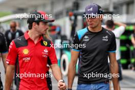 (L to R): Charles Leclerc (MON) Ferrari with Esteban Ocon (FRA) Alpine F1 Team. 21.09.2023. Formula 1 World Championship, Rd 17, Japanese Grand Prix, Suzuka, Japan, Preparation Day.
