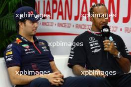 (L to R): Sergio Perez (MEX) Red Bull Racing and Lewis Hamilton (GBR) Mercedes AMG F1 in the FIA Press Conference. 21.09.2023. Formula 1 World Championship, Rd 17, Japanese Grand Prix, Suzuka, Japan, Preparation Day.