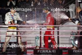 (L to R): Race winner Max Verstappen (NLD) Red Bull Racing celebrates on the podium with third placed Sergio Perez (MEX) Red Bull Racing. 18.11.2023. Formula 1 World Championship, Rd 22, Las Vegas Grand Prix, Las Vegas, Nevada, USA, Race Day.