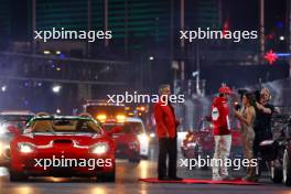 (L to R): Bruce Buffer (USA) Announcer; Charles Leclerc (MON) Ferrari; and Natalie Pinkham (GBR) Sky Sports Presenter on the drivers' parade. 18.11.2023. Formula 1 World Championship, Rd 22, Las Vegas Grand Prix, Las Vegas, Nevada, USA, Race Day.