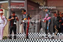 Race winner Max Verstappen (NLD) Red Bull Racing celebrates on the podium with Pierre Wache (FRA) Red Bull Racing Technical Director and Esteban Ocon (FRA) Alpine F1 Team. 28.05.2023. Formula 1 World Championship, Rd 7, Monaco Grand Prix, Monte Carlo, Monaco, Race Day.