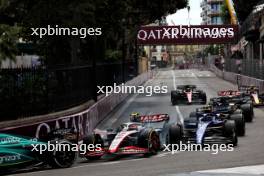 Nico Hulkenberg (GER) Haas VF-23 and Logan Sargeant (USA) Williams Racing FW45 at the start of the race. 28.05.2023. Formula 1 World Championship, Rd 7, Monaco Grand Prix, Monte Carlo, Monaco, Race Day.