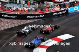 Yuki Tsunoda (JPN) AlphaTauri AT04 leads Zhou Guanyu (CHN) Alfa Romeo F1 Team C43 and Alexander Albon (THA) Williams Racing FW45. 28.05.2023. Formula 1 World Championship, Rd 7, Monaco Grand Prix, Monte Carlo, Monaco, Race Day.