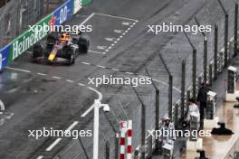 Lance Stroll (CDN) Aston Martin F1 Team watches Max Verstappen (NLD) Red Bull Racing RB19 pass. 28.05.2023. Formula 1 World Championship, Rd 7, Monaco Grand Prix, Monte Carlo, Monaco, Race Day.